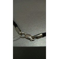 Шелковый шнурок с серебряным окончанием